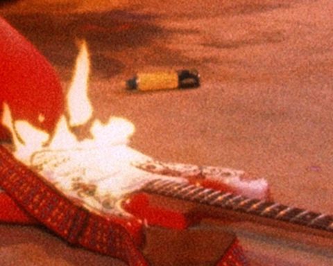 Jimi Hendrix burning his guitar at the Monterey Pop Festival in 1967